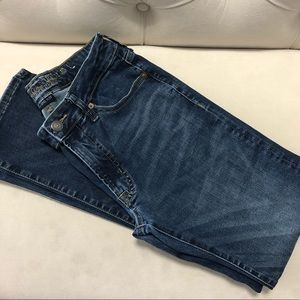 American Eagle Outfitters dark wash jeans.
